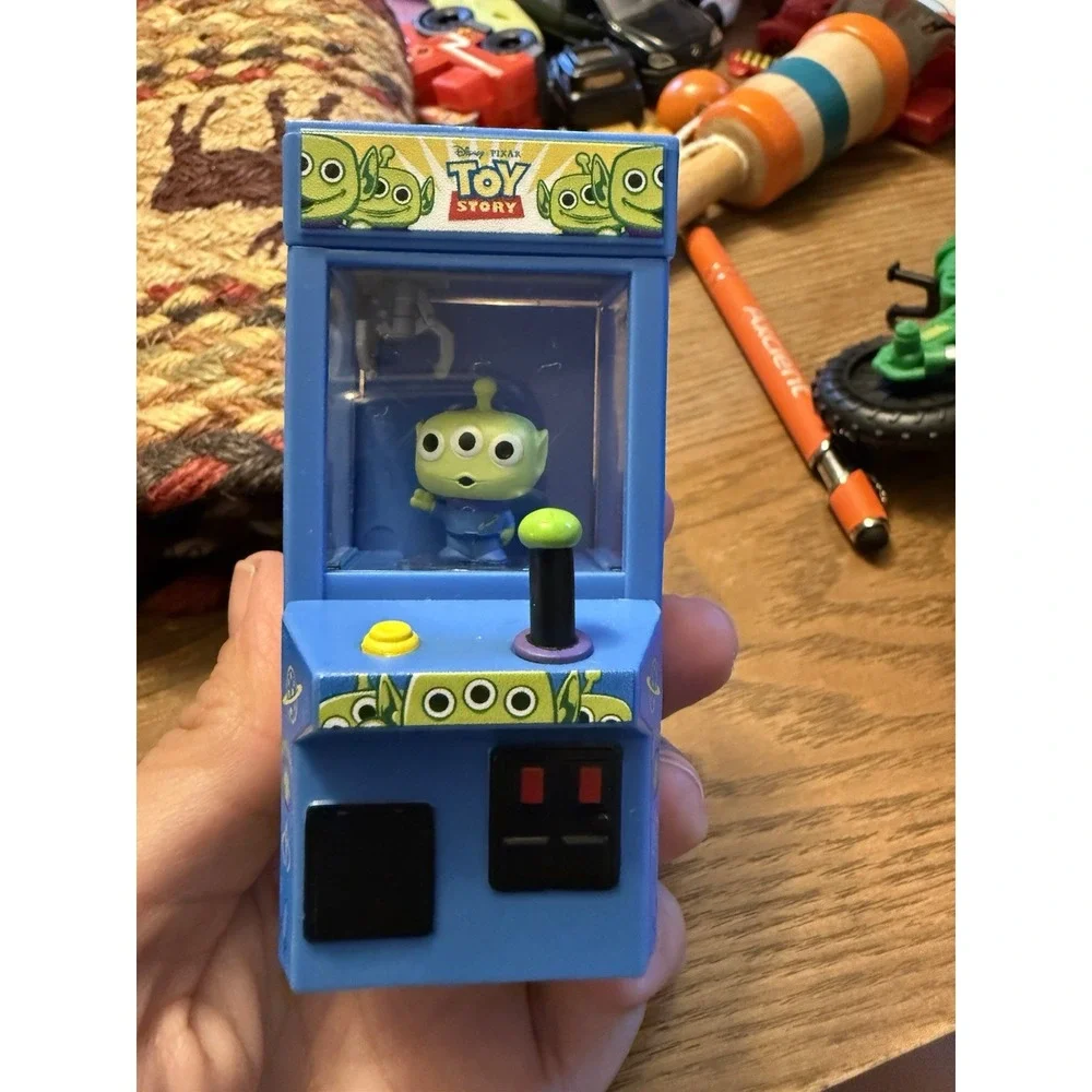 Funko Bitty Arcade Claw: Toy Story - Alien (Glow-in-the-Dark) 2025